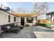 Relaxing outdoor space with stylish lounge seating and cozy fire pit at 1248 Ursula St, Aurora, CO 80011