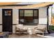 Cozy patio area with stylish seating, perfect for outdoor relaxation at 1248 Ursula St, Aurora, CO 80011