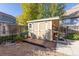 Well-maintained backyard shed with a deck and garden at 20496 E Layton Pl, Aurora, CO 80015