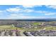 Scenic aerial view of the neighborhood, showcasing community layout and proximity to open spaces at 21102 E Stanford Dr, Aurora, CO 80015