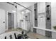 A well-lit bathroom with a double vanity, soaking tub, and separate shower at 21102 E Stanford Dr, Aurora, CO 80015