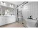 Beautifully designed bathroom with a freestanding tub and glass-enclosed shower at 21102 E Stanford Dr, Aurora, CO 80015