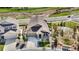 Aerial view of home with well-maintained front yard, landscaping, and neighborhood streets at 21102 E Stanford Dr, Aurora, CO 80015
