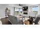 Cozy living space with a fireplace, mounted television, and sliding glass doors leading to an outdoor area at 21102 E Stanford Dr, Aurora, CO 80015