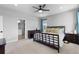 Comfortable bedroom with an ensuite bathroom that provides easy access at 21102 E Stanford Dr, Aurora, CO 80015