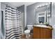 Full bathroom with shower/tub and vanity, featuring a neutral color scheme and modern fixtures at 4184 Netherland St, Denver, CO 80249