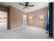 Bedroom showing access to walk-in closet and ensuite bath at 21780 E Heritage Pkwy, Aurora, CO 80016