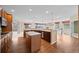 Beautiful kitchen with cherry cabinets, granite countertops, and stainless steel appliances at 21780 E Heritage Pkwy, Aurora, CO 80016