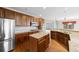 Gourmet kitchen with stainless steel appliances, custom cabinets and granite countertops at 21780 E Heritage Pkwy, Aurora, CO 80016
