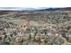 Expansive aerial view of the neighborhood showcasing the mountain views and surroundings at 49 Dawn Heath Cir, Littleton, CO 80127