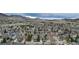 Aerial view of the community showcasing a well-maintained neighborhood with mountain views at 49 Dawn Heath Cir, Littleton, CO 80127