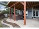 Backyard patio features a built-in hot tub and overlooks the spacious landscaped yard at 49 Dawn Heath Cir, Littleton, CO 80127