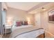 Bedroom with white iron frame bed, complementary bedside tables and plush lavender pillows at 49 Dawn Heath Cir, Littleton, CO 80127