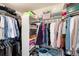 Walk-in closet with ample storage, shelving, and hanging space for an organized wardrobe at 49 Dawn Heath Cir, Littleton, CO 80127