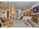 Bright living room with hardwood floors, fireplace and view of entryway at 9233 W Virginia Dr, Lakewood, CO 80226