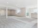 Open basement featuring neutral carpet, bright lighting and ready to be finished at 4716 Twelve Oaks Way, Castle Rock, CO 80104