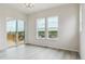 Bright bedroom featuring lots of natural light, wood floors and sliding door to the balcony at 4716 Twelve Oaks Way, Castle Rock, CO 80104
