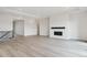 Spacious living room features modern fireplace and lots of open space, ready for entertaining at 4716 Twelve Oaks Way, Castle Rock, CO 80104