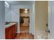 Bathroom showcasing a double sink vanity with access to the walk-in closet at 11158 Carbondale St, Firestone, CO 80504