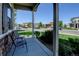 Inviting front porch with seating, view of the street, and stylish stone accents at 11158 Carbondale St, Firestone, CO 80504