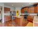 Well-equipped kitchen with stainless steel appliances, an island, and plenty of cabinet space at 11158 Carbondale St, Firestone, CO 80504