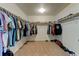 Organized walk-in closet with racks, shelves, and ample storage space at 11158 Carbondale St, Firestone, CO 80504