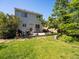 The home's backyard provides a lush lawn and hardscaped space for entertaining or relaxing at 21351 E Williamette Pl, Centennial, CO 80015