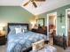 Cozy bedroom with en-suite bathroom and ample natural light at 21351 E Williamette Pl, Centennial, CO 80015