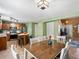 Combined kitchen and dining space, great lighting and view to living space at 21351 E Williamette Pl, Centennial, CO 80015
