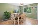 Bright dining room featuring neutral paint, lovely decor, and a large window at 21351 E Williamette Pl, Centennial, CO 80015