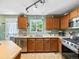 Bright kitchen featuring stainless steel appliances and natural light from the window at 21351 E Williamette Pl, Centennial, CO 80015