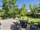 Outdoor patio with comfortable seating and lush greenery offers an ideal spot for relaxation and entertaining at 21351 E Williamette Pl, Centennial, CO 80015
