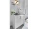 Modern bathroom featuring a sleek vanity, matte black fixtures, and contemporary lighting for a spa-like experience at 5148 W 44Th Ave, Denver, CO 80212