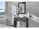 Stylish bedroom vignette showcases a modern table with storage, elegant artwork, and curated decor for a contemporary look at 5148 W 44Th Ave, Denver, CO 80212