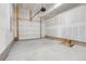 Spacious, unfinished garage with a clean, minimalist aesthetic and potential for customization at 5148 W 44Th Ave, Denver, CO 80212