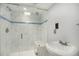 Bathroom showcasing a glass shower with a seat and a modern sink at 6780 W 84Th Cir # 66, Arvada, CO 80003