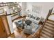 Elegant living room with hardwood floors, chandelier, and stylish furnishings at 7957 Towhee Rd, Parker, CO 80134