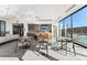 Modern community kitchen and dining area with large windows at 4225 Ridgewalk Pt, Castle Rock, CO 80108