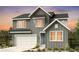 Two-story craftsman style home with gray siding and white trim at 4225 Ridgewalk Pt, Castle Rock, CO 80108