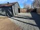 Backyard featuring a detached garage with ample parking on newly laid gravel at 2550 Kendall St, Edgewater, CO 80214