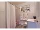 Charming bathroom featuring a bathtub, vanity, and decorative shelving for storage and style at 5294 S Prescott St, Littleton, CO 80120