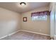 Relaxing bedroom featuring soft carpet, a window, and comfortable ambiance at 5294 S Prescott St, Littleton, CO 80120