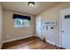 Cozy bedroom featuring hardwood floors, a bright window and neutral paint at 5294 S Prescott St, Littleton, CO 80120
