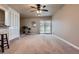 Spacious living room boasts a bar, access to the backyard, and a cozy atmosphere at 5294 S Prescott St, Littleton, CO 80120