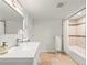 Clean and bright bathroom with a large vanity, shower and neutral color palette for a relaxing atmosphere at 3458 N Clayton St, Denver, CO 80205