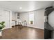 Bright office with a sleek desk, stylish shelving, and natural light, providing a comfortable and productive workspace at 3458 N Clayton St, Denver, CO 80205
