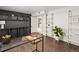 Well-appointed office featuring built-in shelving, a modern desk, and ample storage, creating a stylish and functional workspace at 3458 N Clayton St, Denver, CO 80205
