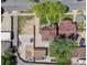 Aerial view of property showcasing house, front yard, backyard, and surrounding neighborhood at 4434 Grove St, Denver, CO 80211