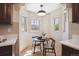 Charming breakfast nook with table, chairs, and plenty of natural light at 4434 Grove St, Denver, CO 80211