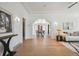 Bright and airy living room featuring hardwood floors, white walls and an open floor plan at 4434 Grove St, Denver, CO 80211